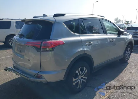 2018 Toyota Rav4 Le z USA, uszkodzony, nr VIN JTMZFREV8JJ211618